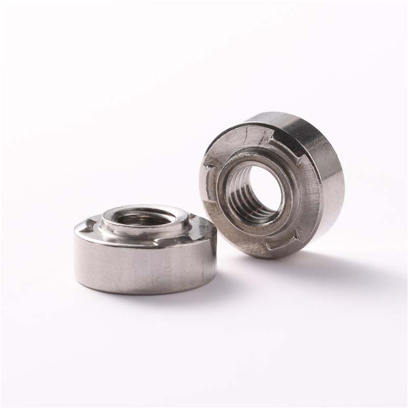 Self clinching projection weld nut