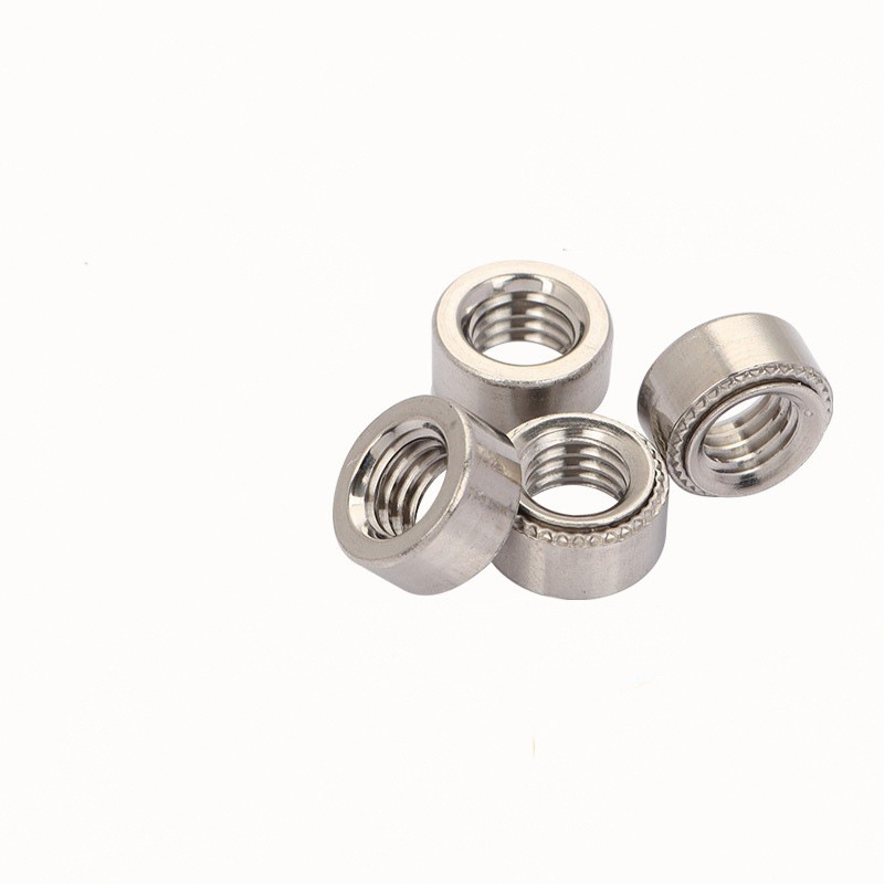 Vibration resistant clinching nut
